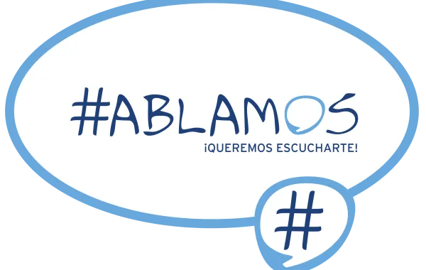 Foto del cartel de hablamos sin h y con una almohadilla delante