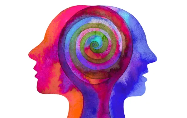 Foto con un dibujo de colores que representa de dos cabezas juntas mirando a lados opuestos