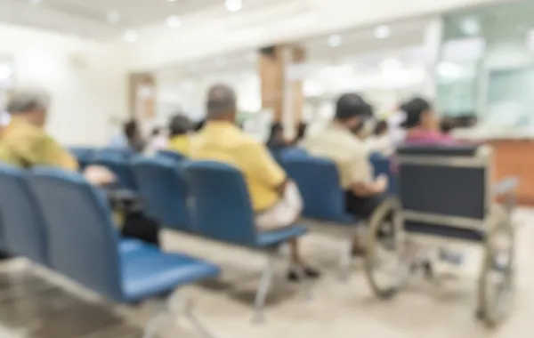 Foto de publico en una conferencia con un efecto no nítido
